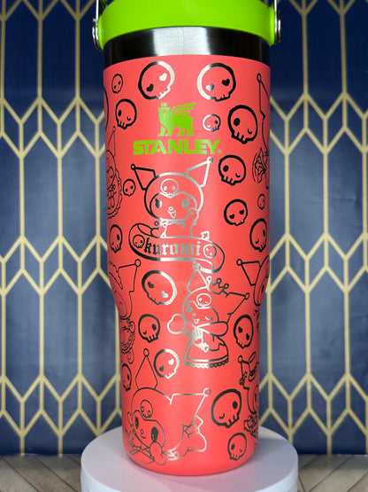 a red cup with a pattern of smiley faces on it