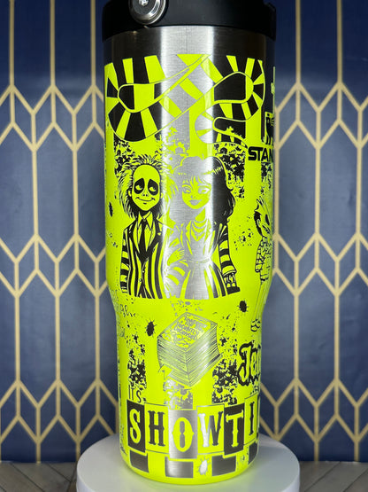 a close up of a yellow and black tube on a wall