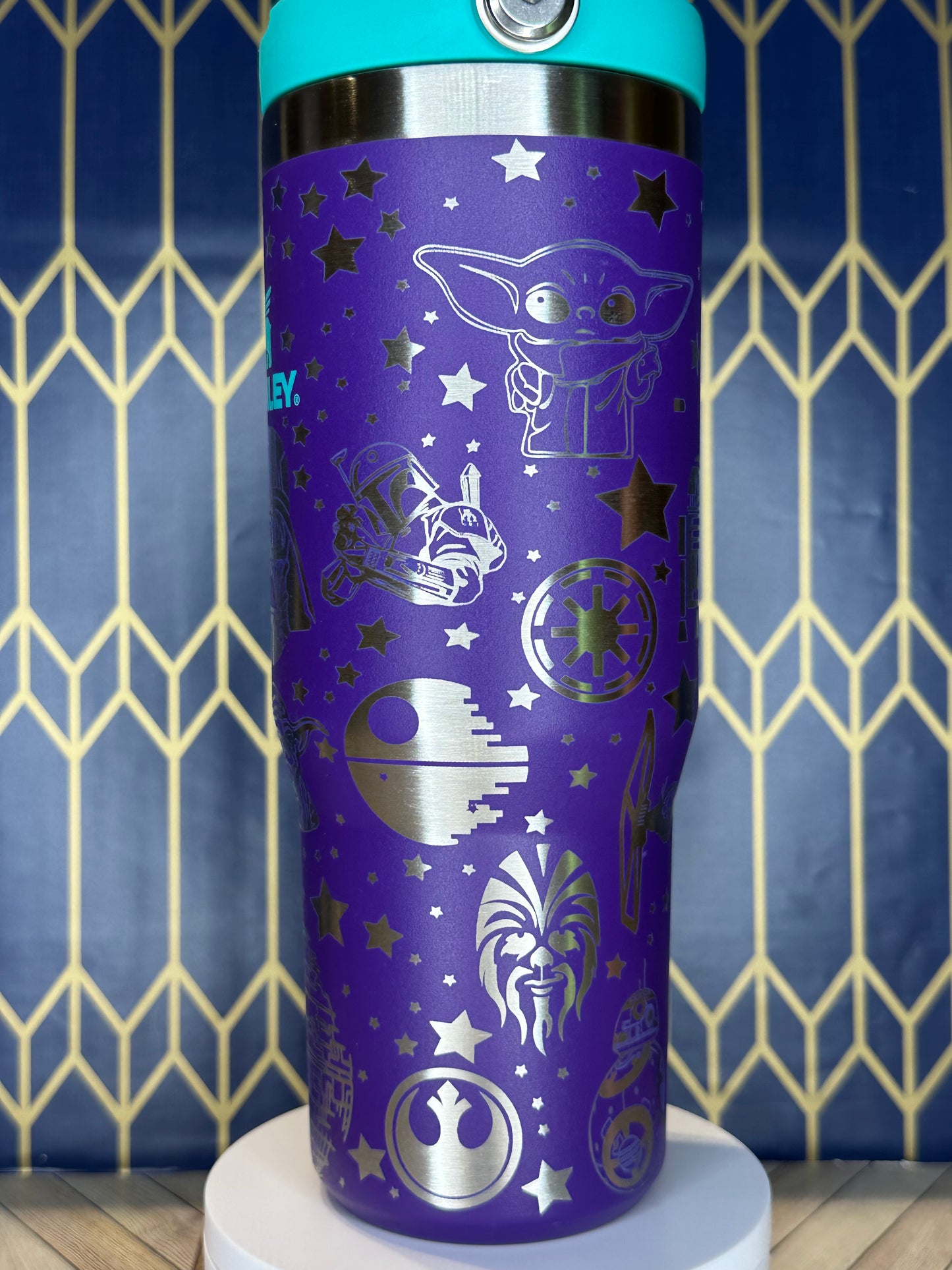 a close up of a purple and blue water bottle