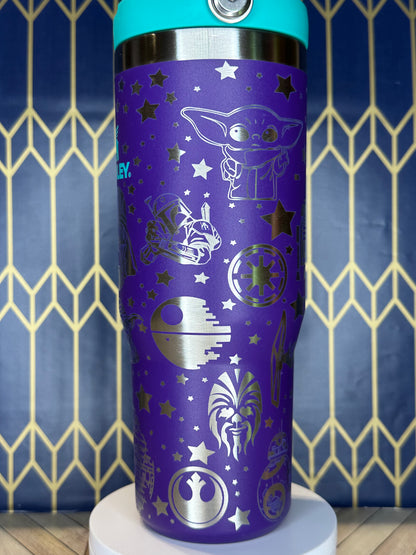 a close up of a purple and blue water bottle