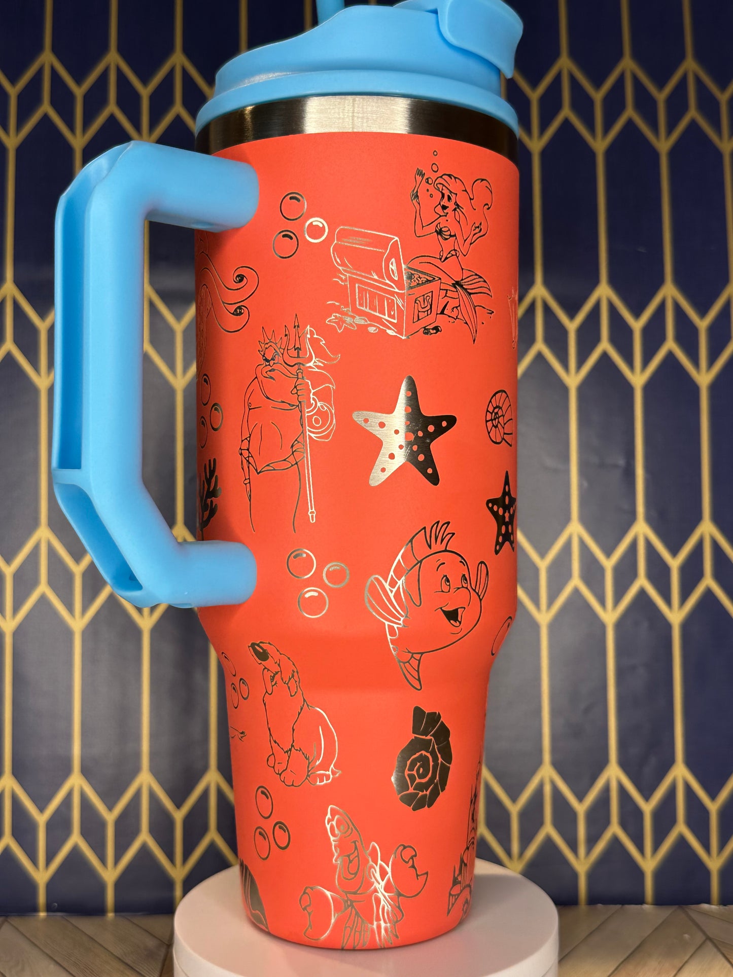 a close up of a water bottle with drawings on it