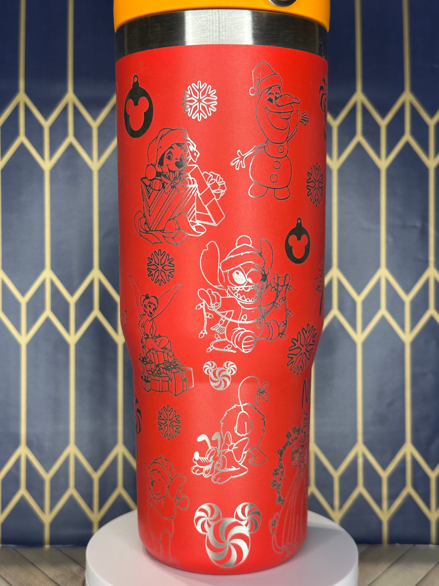 a close up of a red tube with writing on it