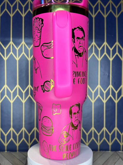 a pink water bottle with a picture of a woman on it