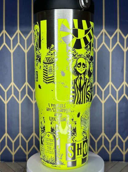 a close up of a yellow and black fire extinguisher