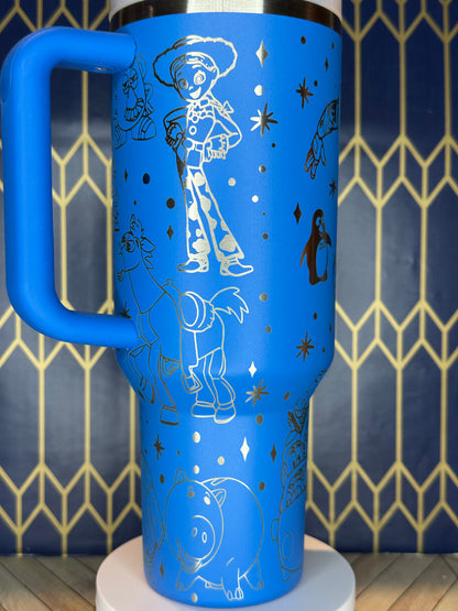 a blue toilet paper dispenser on a wall
