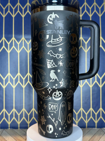 a black and white coffee cup with a pattern on it